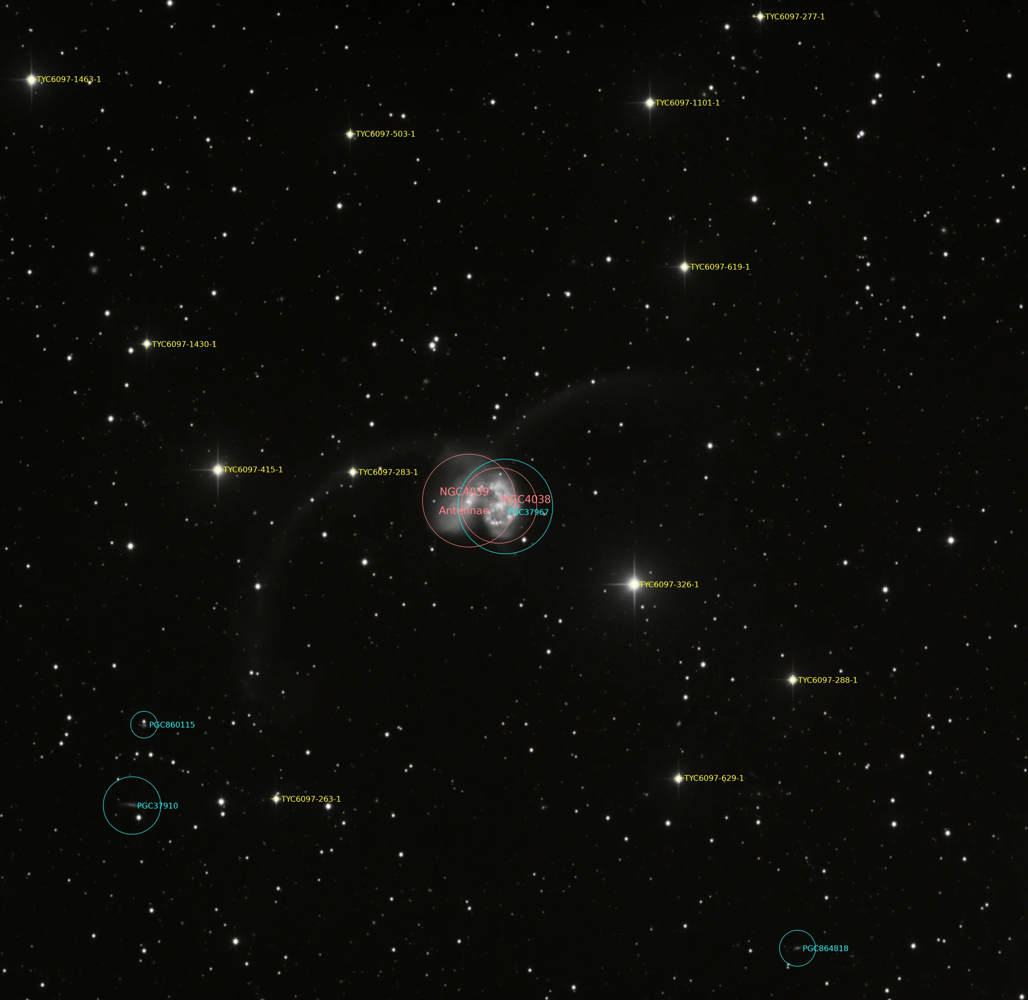 Annotated Antennae Galaxies image identifying foreground stars and distant galaxies